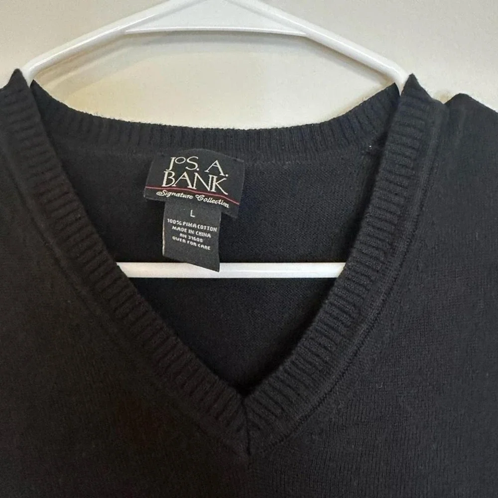 Jos. A. Bank sweater vest in black men's size large in 100% puma cotton.